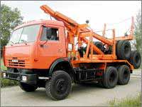 Автомобиль-тягач лесовозный мод.693334, 693324, 693336, 693326, 693327 с механизмом самопогрузки роспуска мод.90092